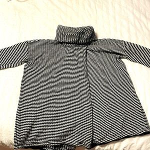Black and white knit turtle neck sweater
